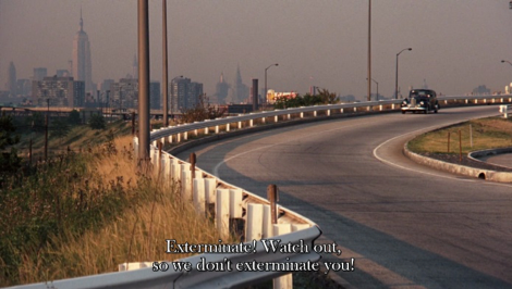 Clemenza says to Paulie, "Exterminate! Watch out so we don't exterminate you!" The car is shown driving a curving country road outside of Manhattan